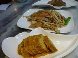 Duck skin, ham and lotus roots