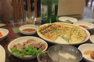 Thin slices of cooked meat and omelette