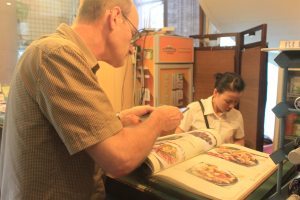 Photographing the menu for clues